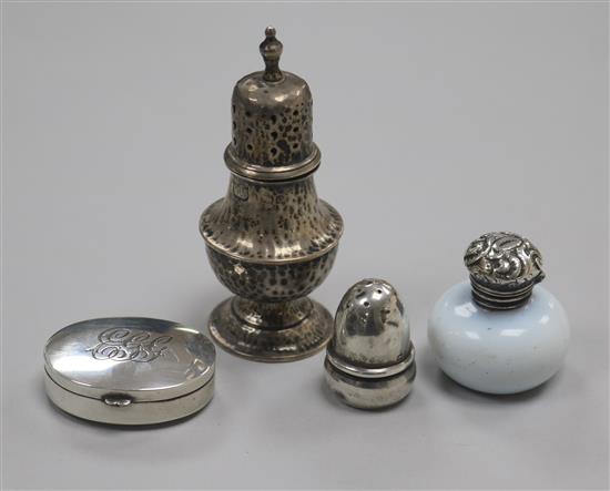 Four silver items including a George V silver acorn pepperette by Saunders & Shepherd